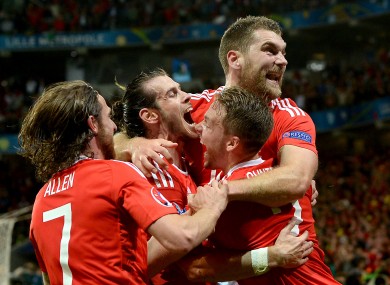 Wales' Sam Vokes (right) celebrates scoring his side's thrid goal of the game.