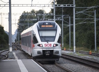 The train in which a man attacked other passengers stands at the station in Salez, Switzerland.