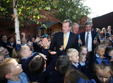 Taoiseach Enda Kenny with Minister for Education Richard Bruton and Minister of State for Training Skills and Innovation John Halligan meeting children from St Brigids School in Dublin.