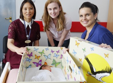 Dr Mendinaro Imcha, Consultant Obstetrician/Gynaecologist, University Maternity Hospital Limerick and Jennifer Clary, CEO The Baby Box Company with Lisa Healy with her brand new baby, Leah from Templemore, Co Tipperary.