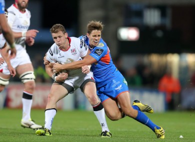 Craig Gilroy being tackled by Aled Thomas during Friday's win against Scarlets.