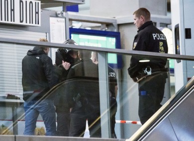 Police officers patrol the Central Station in the eastern city of Chemnitz.