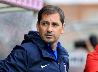 The former Celtic defender will remain on until a replacement is found.