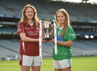 Duggan, left, with Shane O'Neills captain Louise Kenny. The sides meet in Parnell Park on Sunday (throw-in 1pm).