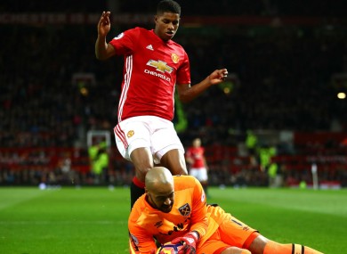 West Ham's Darren Randolph denies Marcus Rashford.