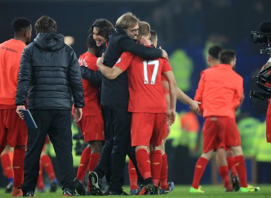 Liverpool manager Jurgen Klopp and Liverpool's Ragnar Klavan embrace after the final whistle.
