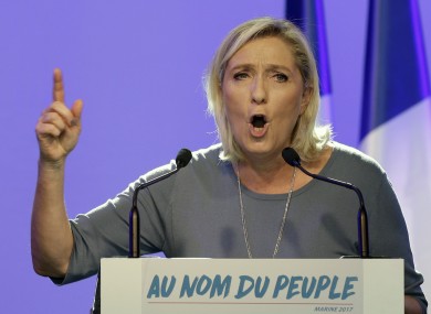 Le Pen delivers a speech in September.