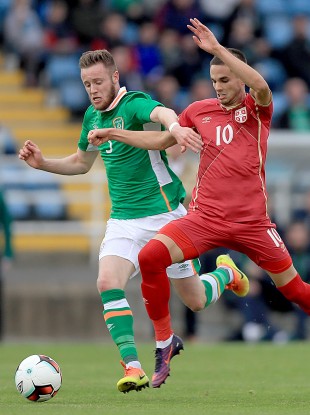 Kevin O'Connor tussling with Mijat Gacinovic during Ireland's 2017 Euro U21 qualifier against Serbia at the Waterford RSC in October.