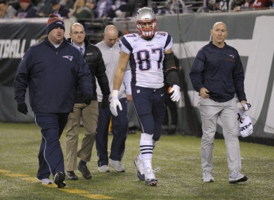Rob Gronkowski walks off the field with an injury during last weekend's game against the New York Jets.