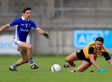 Ulster's Stefan Campbell with Aidan O'Mahony (left) of Munster.