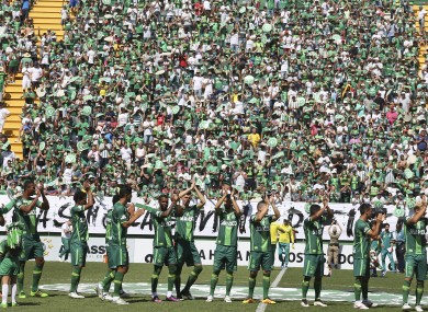 New Chapecoense players applaud prior to the friendly match against Palmeiras.