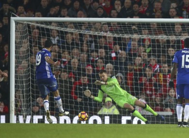 Chelsea's Diego Costa, left, has a penalty shot saved by Liverpool's goalkeeper Simon Mignolet.