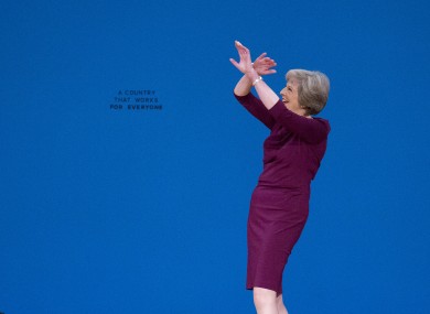 Prime Minister Theresa May waving to crowds at the recent Conservative party conference.