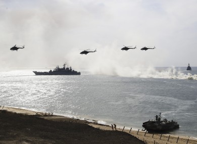 FILE: Russian navy ships and helicopters take a part in a landing operation during military drills at the Black Sea coast, Crimea.