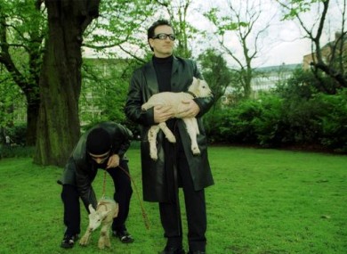 Bono and the Edge of U2, take two lambs to graze in Dublins St. Stephen's Green, to exercise the rights given them after they were awarded the Freedom of City.
