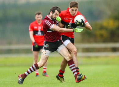 St Mary's Kevin McKernan and UCC's Adrian Spillane.