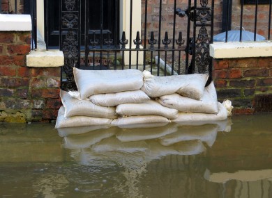 Mahon said he put sandbags around his home, but the water kept rising. It got to a stage where the family dog was swimming in the yard before being rescued (file photo).