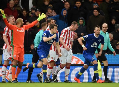 Everton's Seamus Coleman (centre) celebrates his side's goal.