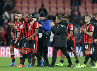 Bournemouth's Benik Afobe celebrates with team mates after the final whistle.