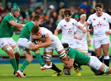 onny Stewart and Caelan Doris tackle Nick Isiekwe