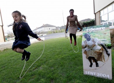 Josiane recreating the photograph on the 2004 Trócaire box with a pupil from a Dublin school.