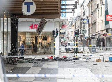 The site of a violent attack is blocked by the police in Stockholm, Sweden.
