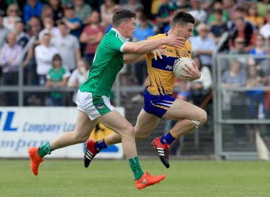 Clare's Jamie Malone and Ian Corbett of Limerick.