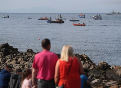 Onlookers as the search persisted into the evening at Skerries harbour yesterday