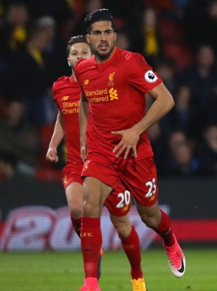 Emre Can celebrates after scoring for Liverpool against Watford.