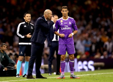 Real Madrid manager Zinedine Zidane (left) gives instructions to Real Madrid's Cristiano Ronaldo (right) during the Champions League final earlier this month.