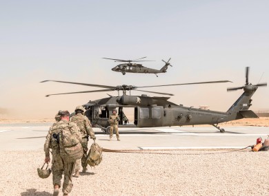 A U.S. Army UH-60 Black Hawk helicopter crew chief assigned to Task Force Griffin, 16th Combat Aviation Brigade in Kunduz.