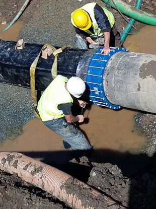 A new pipe being fitted at the burst main in Donore, Co Meath, which caused a water shortage in the Drogheda area over the past week
