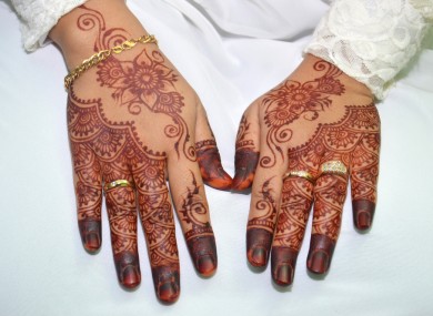 File photo of henna on an Indonesian bride's hands