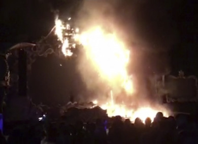 The fire quickly engulfed the main stage