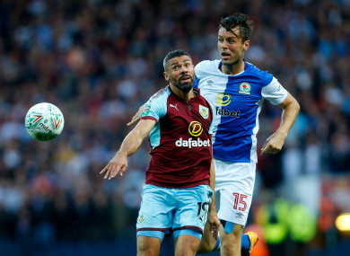 Blackburn's Elliott Ward in action with Burnley's Jonathan Walters (left).