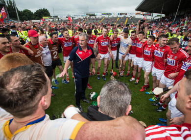 Kieran Kingston and his Cork players after the Munster final win.