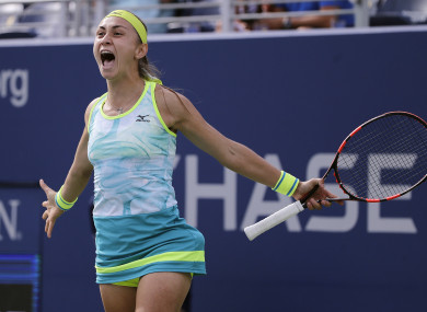 Aleksandra Krunic, of Serbia, reacts after beating Johanna Konta, of Great Britain.