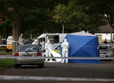Investigations at the scene of the shooting on Tuesday.