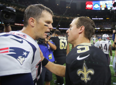 Tom Brady and New Orleans Saints quarterback Drew Bree after the game.