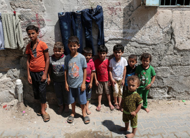 Palestinian children playing in the street, at Rafah refugee camp in the southern Gaza Strip.