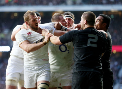 England's Chris Robshaw clashes with Dane Coles of New Zealand during the last meeting of the two sides.