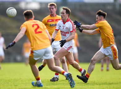 Ballintubber's Alan Dillon with Johnny Maughan, Danny Kirby and Donie Newcombe of Castlebar Mitchels.