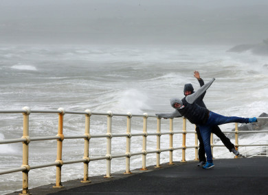 People battle yesterday's winds in Lahinch, Co Clare.