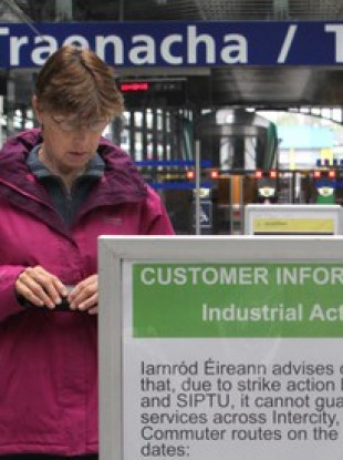 File photo: Woman finding out that there's no train service over strike action in 2014