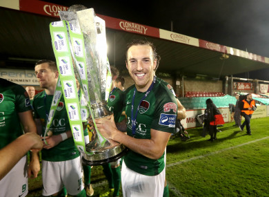 Sheppard lifting the Premier Division trophy.