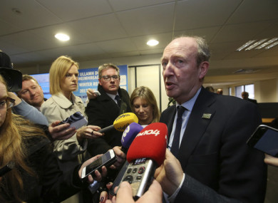 Transport Minister Shane Ross speaks to reporters today.