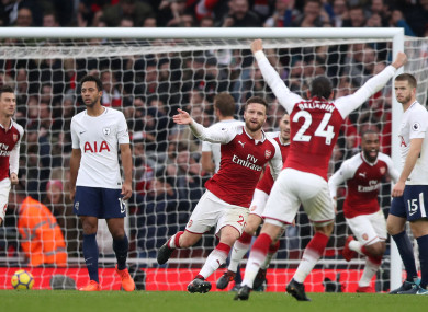 Shkodran Mustafi celebrates scoring the opening goal.