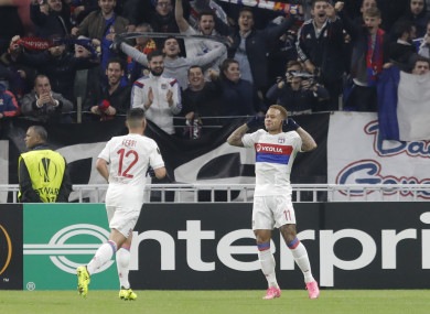 Lyon's Memphis Depay (right) celebrates with team-mate Jordan Ferri.