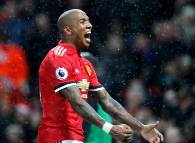 Ashley Young celebrates.