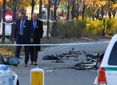 Police secure the scene at the bike path at Houston Street and West Street in lower Manhattan.